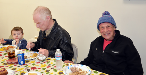 Child and Elderly People Eating